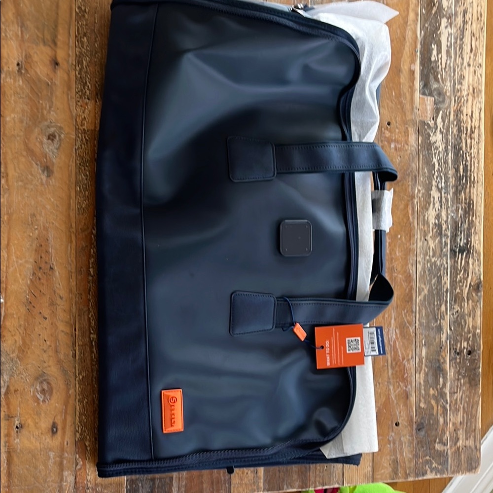 Black and Orange Duffel Bag with Water-Resistant Material